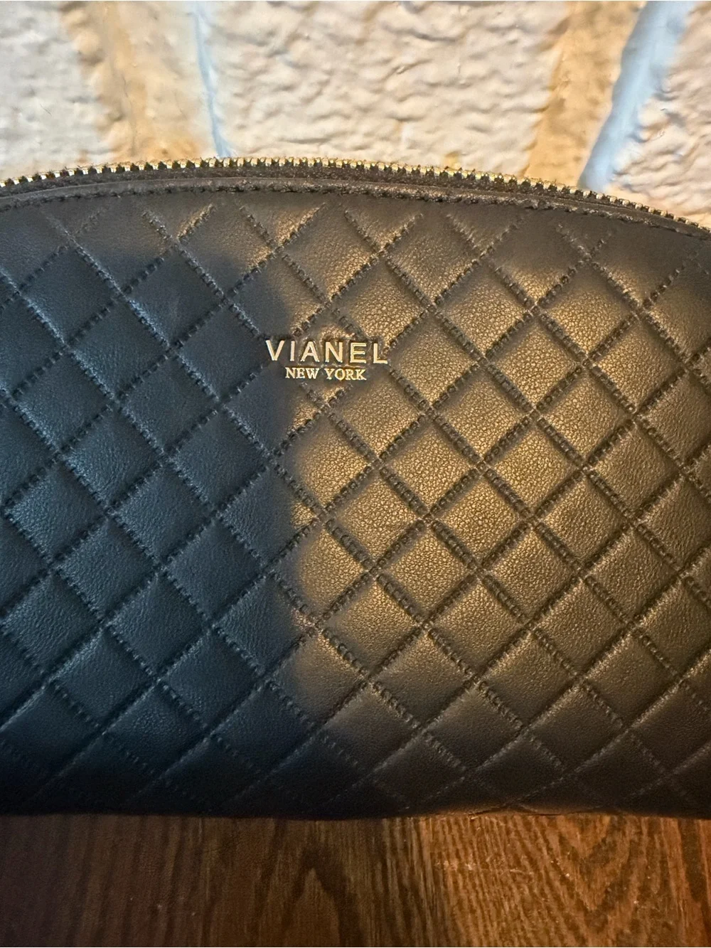 NWT! VIANEL NEW YORK Dome Dopp Kit with gold logo on the front.